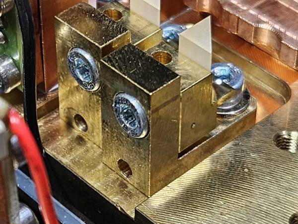 Screws and bend holes in a friction mount