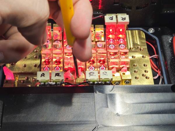 pry bar in the hole pushing against a side